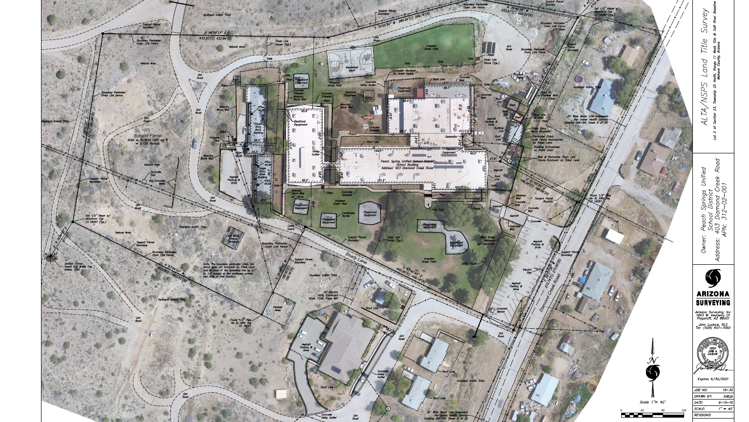 Completed survey plan shown over aerial imagery for a developed site.