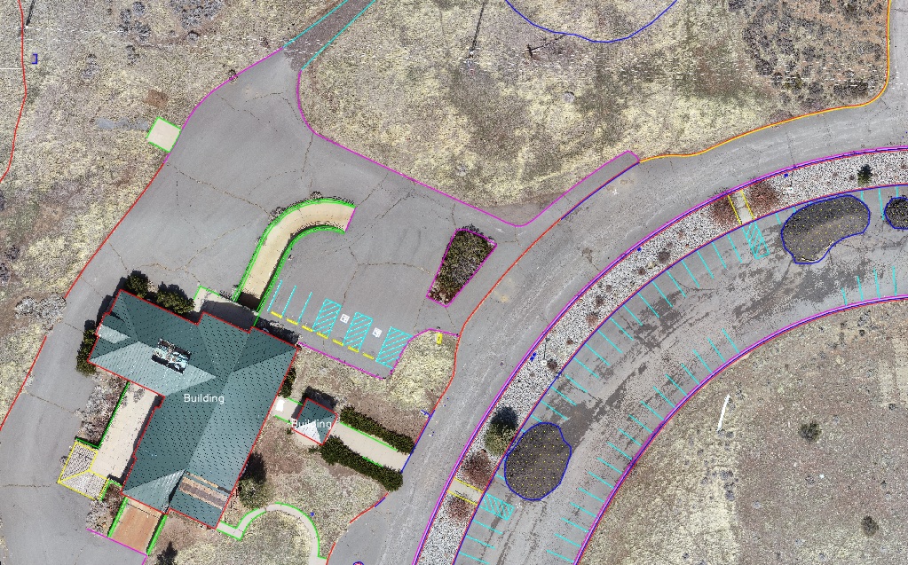 Drafted site map with linework over aerial imagery and marked features.