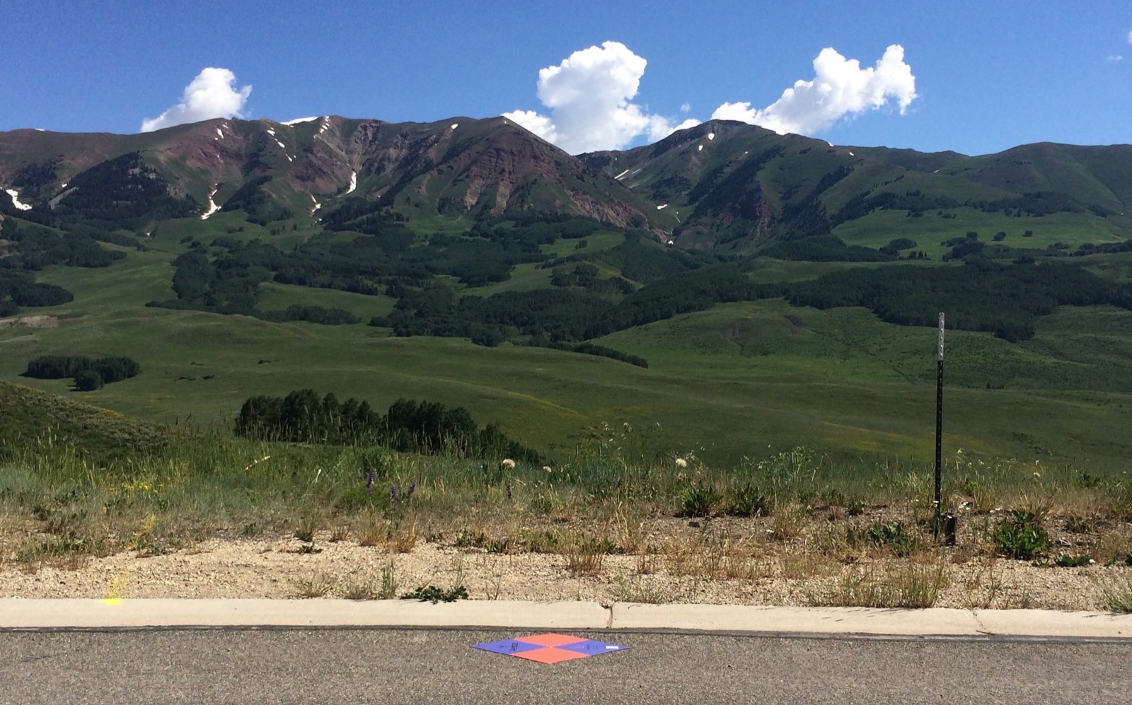Ground control point set in front of a mountain survey site.